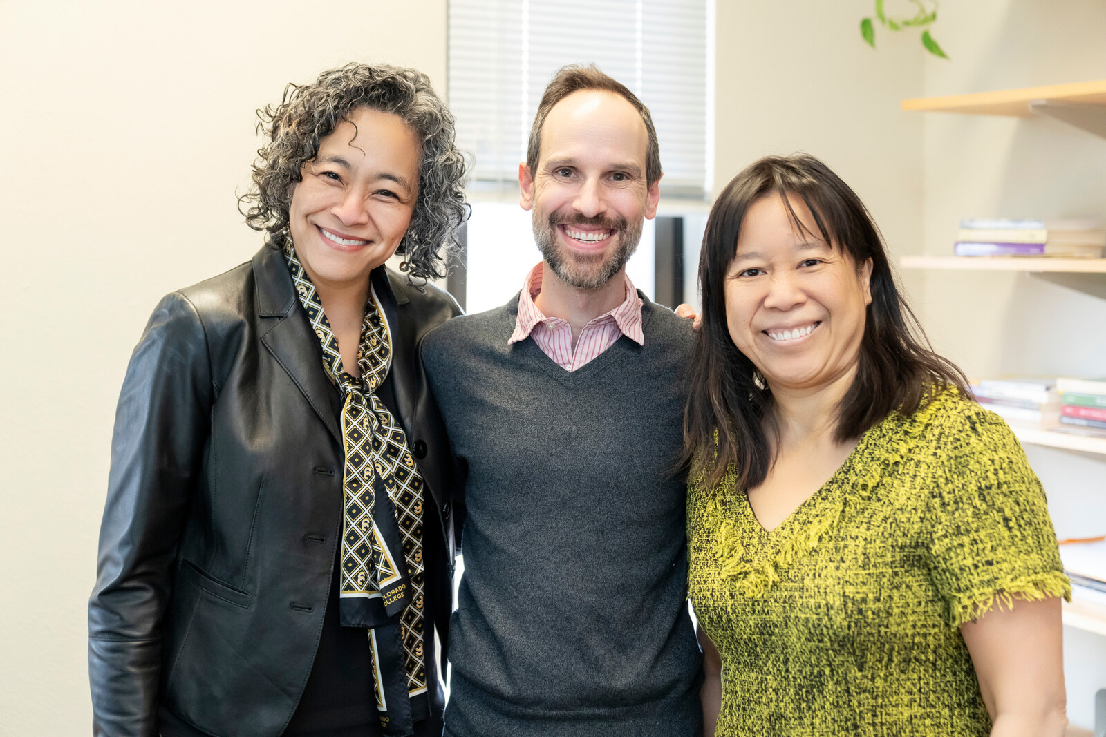 Sylvan Goldberg, Assistant Professor of English, center. President L. Song Richardson (L) and Dean of Faculty Emily Chan (R).